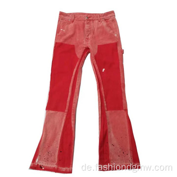 Recycelbare gesunde, geflickte rote Vintage -Jeans